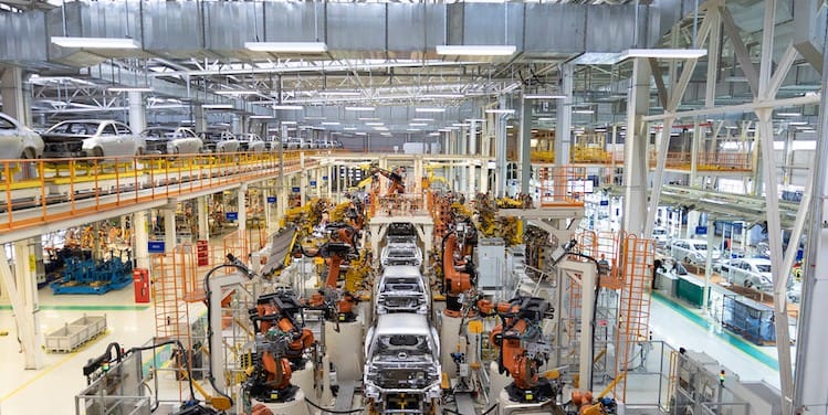 body of car on conveyor Modern Assembly of cars at plant. automated build process of car body